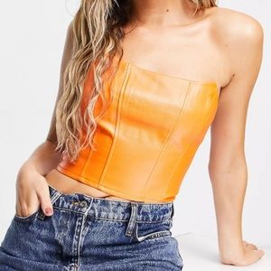 COLLUSION faux leather corset in orange
